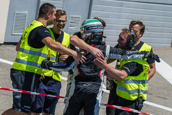 Race winner #911 Precote Herberth Motorsport Porsche 991 GT3 R: Daniel Allemann celebrates in parc ferme with his team