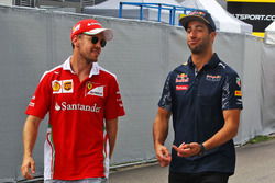 Sebastian Vettel, Ferrari with Daniel Ricciardo, Red Bull Racing