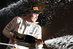 Race winner Nico Rosberg, Mercedes AMG F1 celebrates on the podium