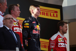 The podium, Ferrari, second; Max Verstappen, Red Bull Racing, race winner; Sebastian Vettel, Ferrari, third