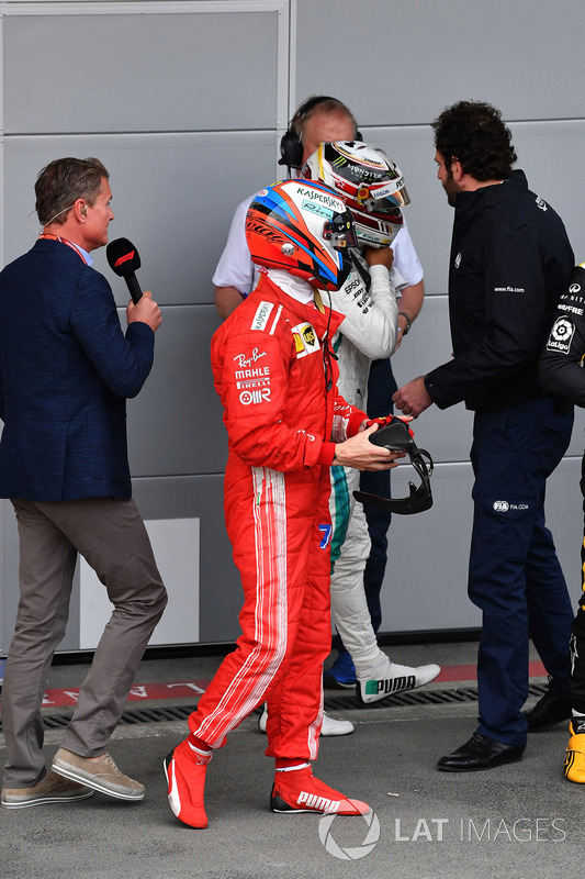 Kimi Raikkonen, Ferrari and Lewis Hamilton, Mercedes-AMG F1 in parc ferme