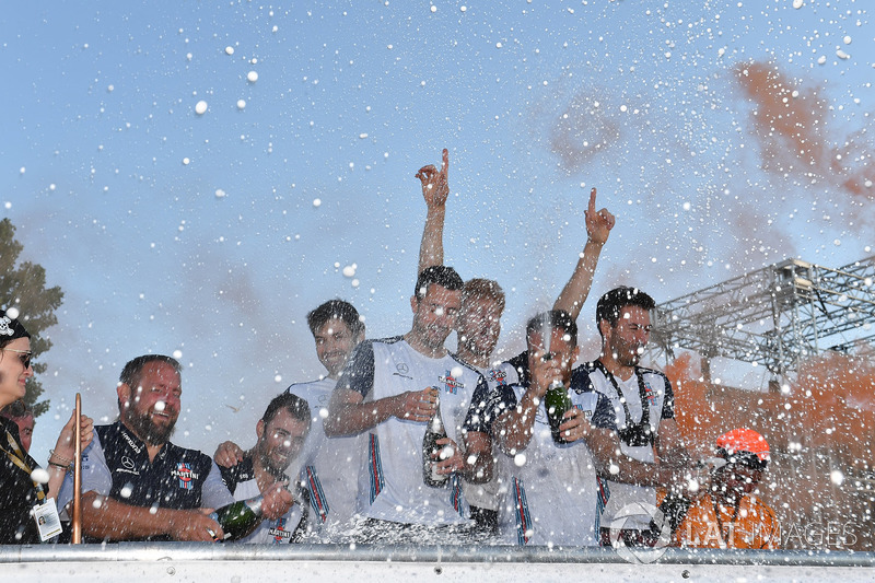 Williams celebrate on the podium at the raft race