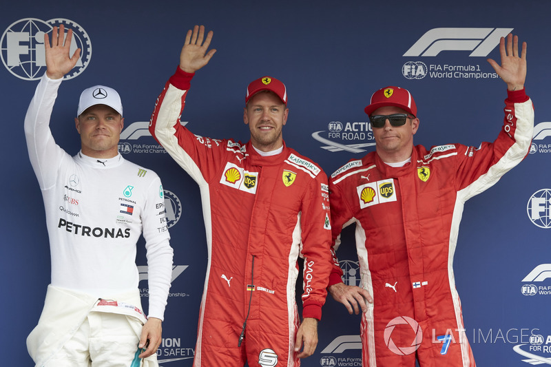 Top three Qualifiers, Valtteri Bottas, Mercedes AMG F1, pole sitter Sebastian Vettel, Ferrari, and Kimi Raikkonen, Ferrari