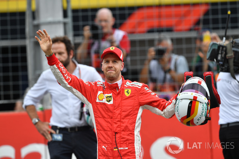 Pole sitter Sebastian Vettel, Ferrari celebrates in parc ferme