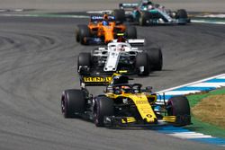 Carlos Sainz Jr., Renault Sport F1 Team R.S. 18, leads Charles Leclerc, Sauber C37, and Fernando Alonso, McLaren MCL33