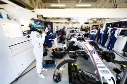 Felipe Massa, Williams FW40, prepares in the team's garage for FP3