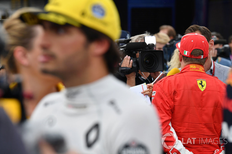 Kimi Raikkonen, Ferrari talks with the media