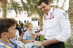 Toto Wolff, Executive Director, Mercedes AMG, signs an autograph