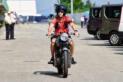Sebastian Vettel, Ferrari on his Triumph motorbike