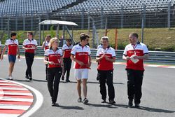 Charles Leclerc, Sauber walks the trackj with Ruth Buscombe, Sauber Race Strategist and Xevi Pujolar, Sauber Head of Track Engineering