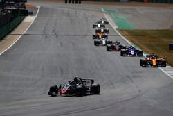 Kevin Magnussen, Haas F1 Team VF-18, lidera a  Fernando Alonso, McLaren MCL33, Pierre Gasly, Toro Rosso STR13, y Romain Grosjean, Haas F1 Team VF-18