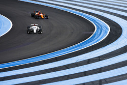 Marcus Ericsson, Sauber C37, leads Fernando Alonso, McLaren MCL33