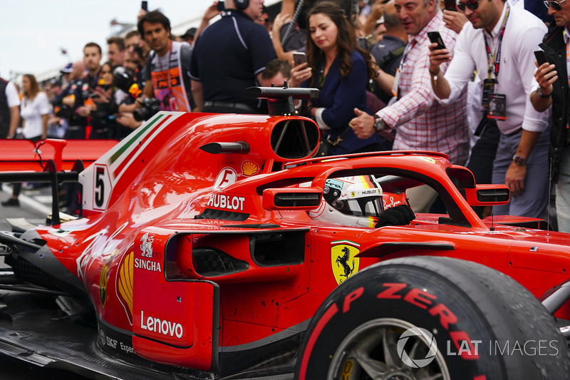 Sebastian Vettel, Ferrari SF71H, 1st position, drives into Parc Ferme