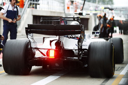 Lance Stroll, Williams FW40, spins his wheels exiting his pit box
