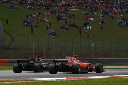 Sebastian Vettel, Ferrari SF70H and Nico Hulkenberg, Renault Sport F1 Team RS17 battle