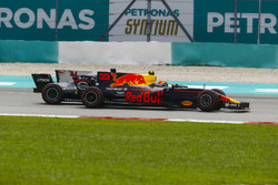 Max Verstappen, Red Bull Racing RB13, passes Lewis Hamilton, Mercedes AMG F1 W08, for the lead