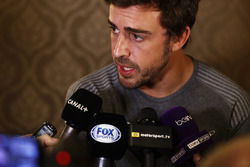 Fernando Alonso talks to the media after announcing his deal to race in the 2017 Indianapolis 500 in an Andretti Autosport run McLaren Honda car