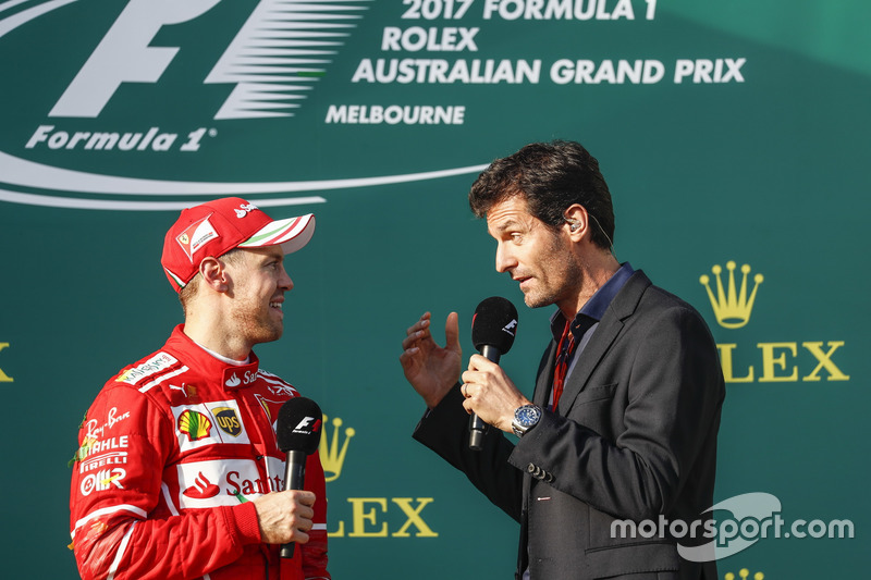 Sebastian Vettel, Ferrari, 1st Position, is interviewed by Mark Webber on the podium