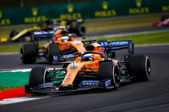 Carlos Sainz Jr., McLaren MCL34, leads Lando Norris, McLaren MCL34