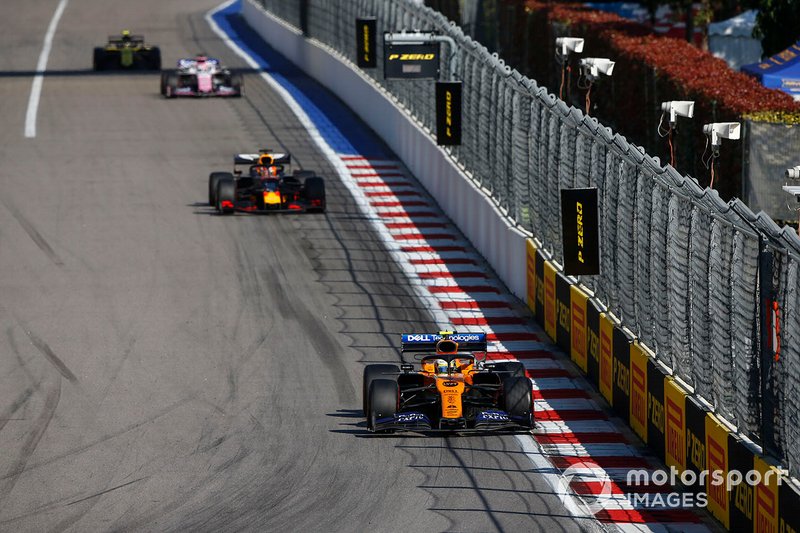 Lando Norris, McLaren MCL34, leads Max Verstappen, Red Bull Racing RB15, Sergio Perez, Racing Point RP19, and Kevin Magnussen, Haas F1 Team VF-19