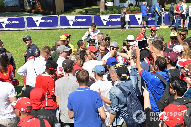 Sebastian Vettel, Ferrari, takes selfies with fans