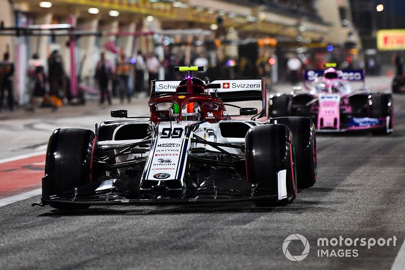 Antonio Giovinazzi, Alfa Romeo Racing C38, leads Lance Stroll, Racing Point RP19, in the pit lane