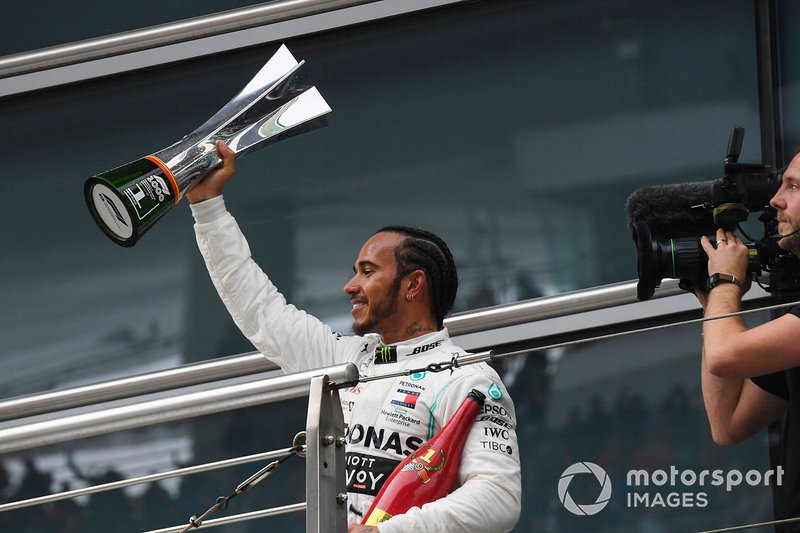 Lewis Hamilton, Mercedes AMG F1, 1st position, with his trophy