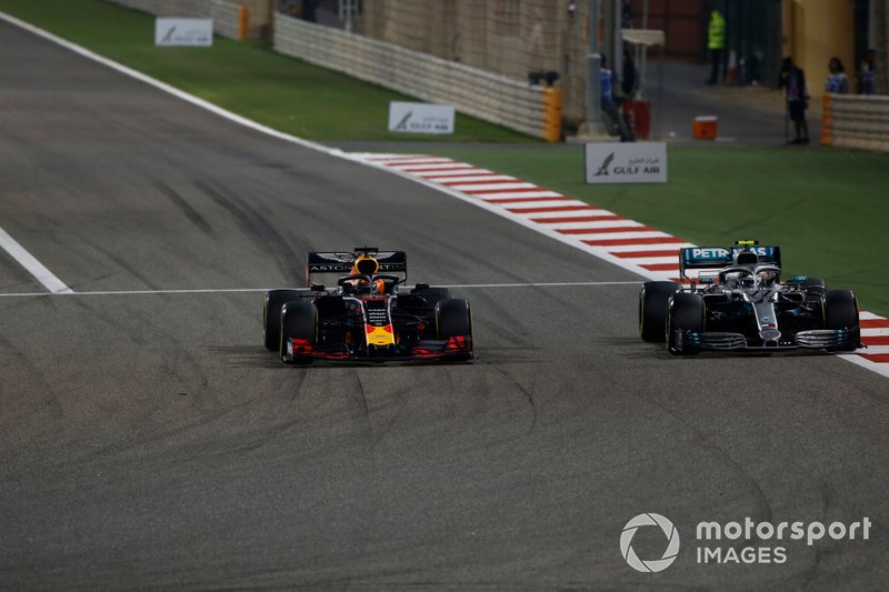 Max Verstappen, Red Bull Racing RB15, battles with Valtteri Bottas, Mercedes AMG W10
