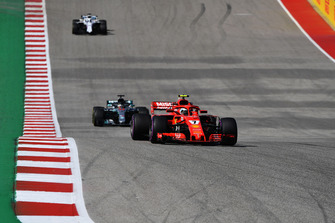 Kimi Raikkonen, Ferrari SF71H leads Lewis Hamilton, Mercedes AMG F1 W09 EQ Power+