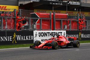 Race winner Sebastian Vettel, Ferrari SF71H crosses the line