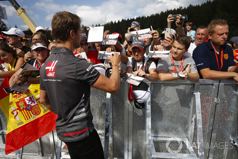 Romain Grosjean, Haas F1 Team, signs autographs for fans