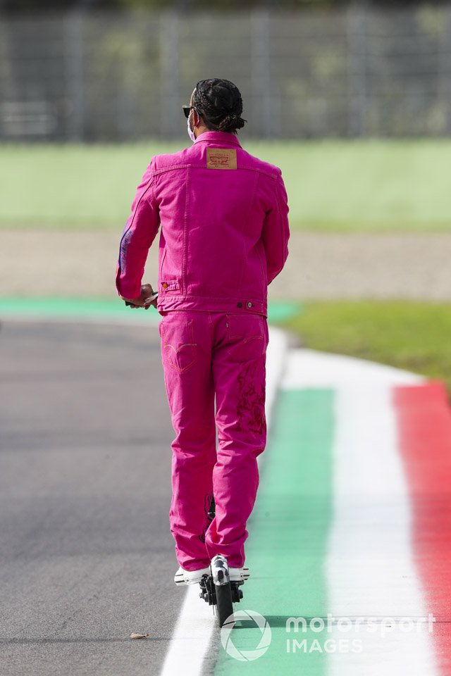 Lewis Hamilton, Mercedes-AMG F1 on a scooter walks the track