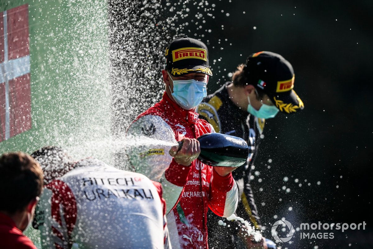 Luca Ghiotto, Hitech Grand Prix, Race Winner Mick Schumacher, Prema Racing and Christian Lundgaard, ART Grand Prix celebrate on the podium with the champagne