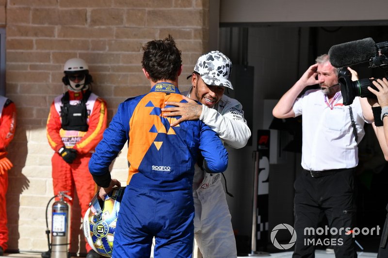 Lando Norris, McLaren, congratulates Lewis Hamilton, Mercedes AMG F1, 2nd position, on securing his sixth world drivers title