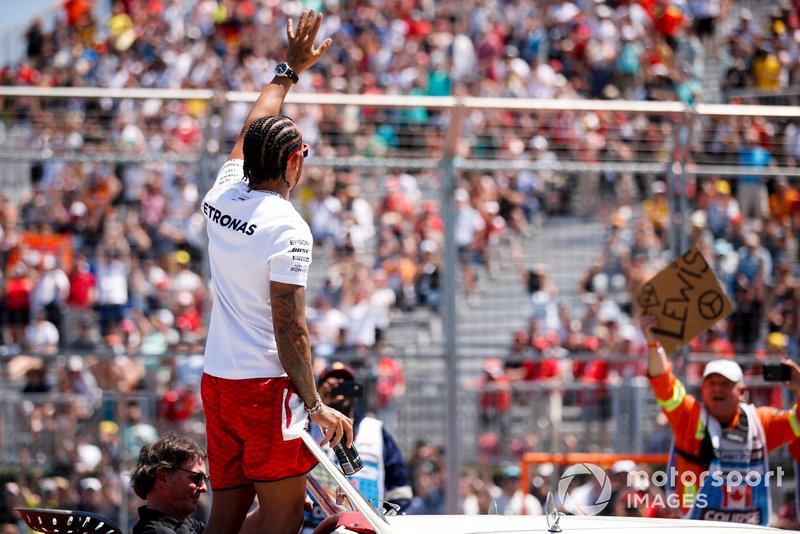 Lewis Hamilton, Mercedes AMG F1, waves to the crowd during the drivers parade