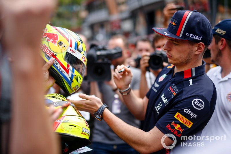 Max Verstappen, Red Bull Racing signs a autograph for a fan