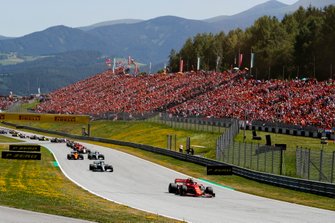 Charles Leclerc, Ferrari SF90, leads Valtteri Bottas, Mercedes AMG W10, Lewis Hamilton, Mercedes AMG F1 W10, Lando Norris, McLaren MCL34, Kimi Raikkonen, Alfa Romeo Racing C38, and the rest of the field at the start
