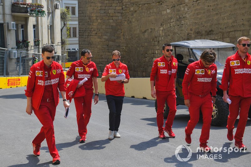 Sebastian Vettel, Ferrari walks the track with his engineers