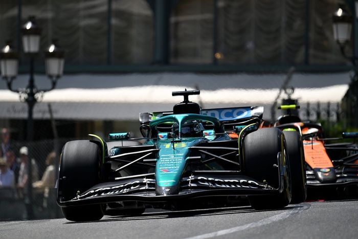 Lando Norris, McLaren, Lance Stroll, Aston Martin Racing