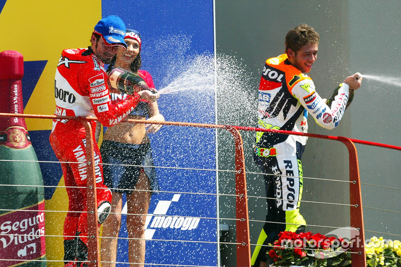 Race winner Valentino Rossi, second place Max Biaggi