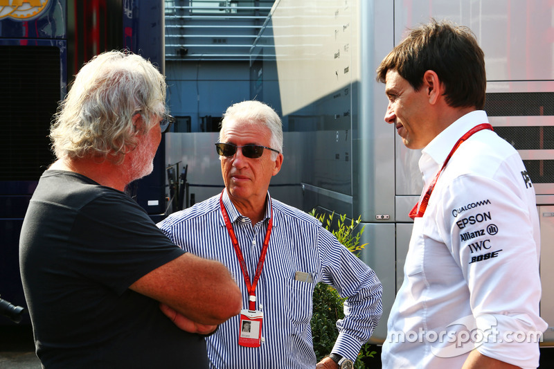 (L to R): Flavio Briatore, with Piero Ferrari, Ferrari Vice-President and Toto Wolff, Mercedes AMG F