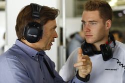 Stoffel Vandoorne, McLaren Test and Reserve driver talks to Jost Capito, McLaren chief executive