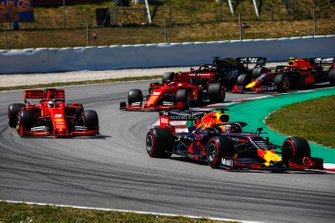 Max Verstappen, Red Bull Racing RB15, leads Sebastian Vettel, Ferrari SF90, Charles Leclerc, Ferrari SF90, Pierre Gasly, Red Bull Racing RB15, and Romain Grosjean, Haas F1 Team VF-19