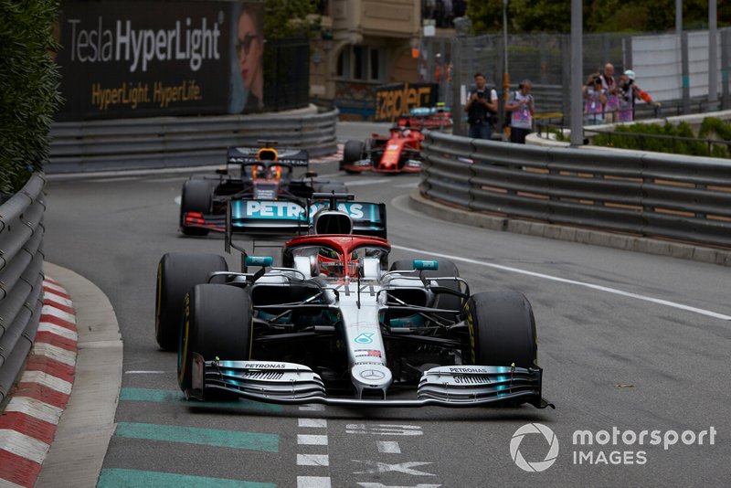Lewis Hamilton, Mercedes AMG F1 W10, leads Max Verstappen, Red Bull Racing RB15