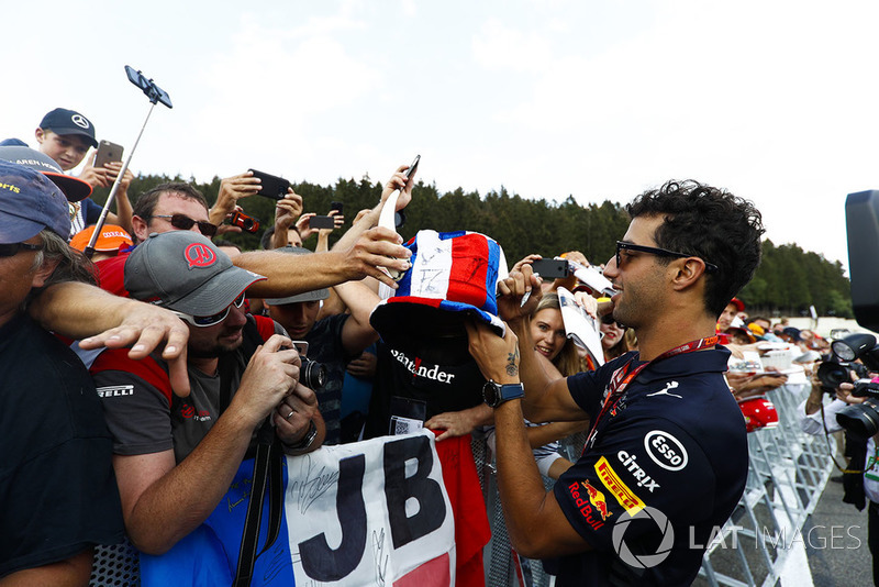 Daniel Ricciardo, Red Bull Racing, signs autographs for fans
