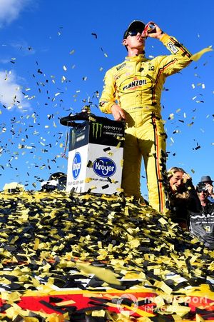 Joey Logano, Team Penske, Ford Mustang Pennzoil, celebrates victory lane after winning the Pennzoil 400.