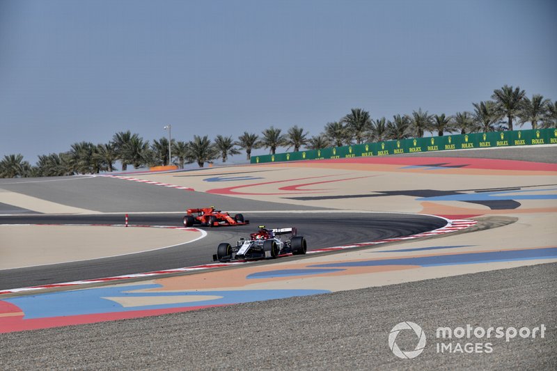 Antonio Giovinazzi, Alfa Romeo Racing C38, leads Charles Leclerc, Ferrari SF90