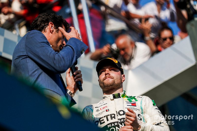 Mark Webber interviews Valtteri Bottas, Mercedes AMG F1, 1st position, on the podium