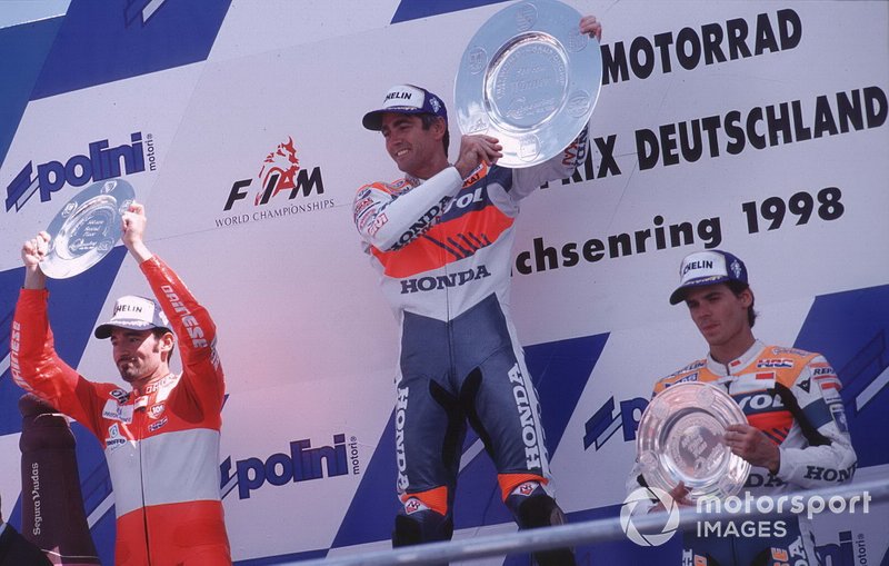 Podium: Race winner Mick Doohan, Repsol Honda, second place Max Biaggi, Honda, third place Alex Criville, Repsol Honda