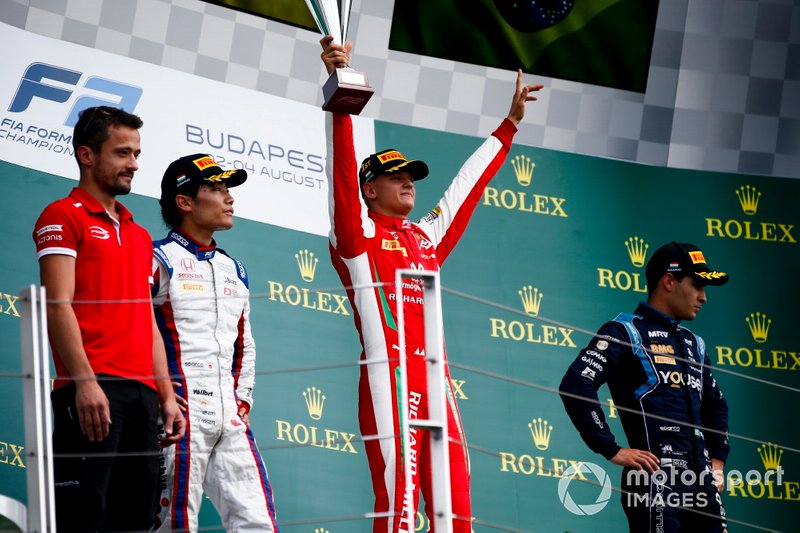 Nobuharu Matsushita, Carlin, Race winner Mick Schumacher, Prema Racing and Sergio Sette Camara, Dams celebrate on the podium